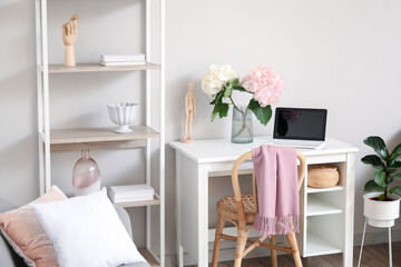 Interior of stylish room with modern workplace