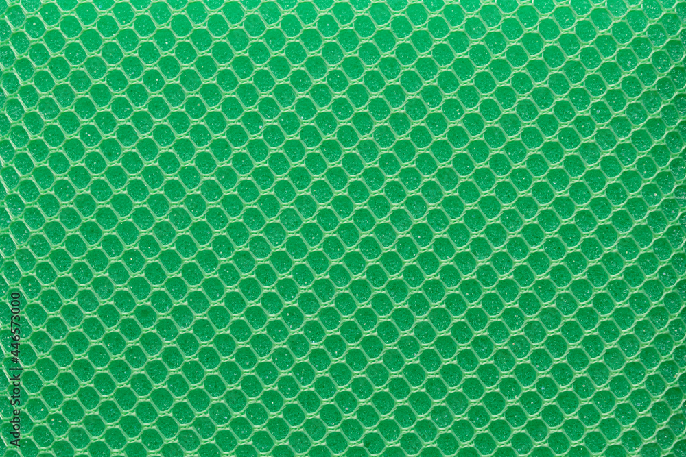 Poster full frame green hexagon mesh pattern background.