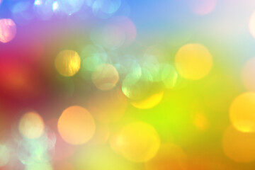 Colored defocused background with glowing bokeh. Summer background.