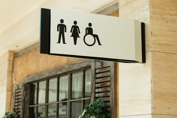 Obraz premium Toilet sign: male, female and handicapped in a shopping center. Close-up.