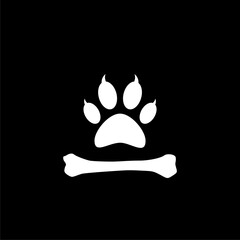 Paw and bone icon isolated on dark background