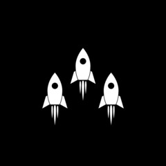 Three rockets fly up icon isolated on dark background