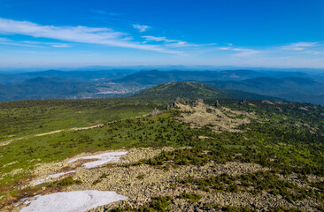 Sheregesh ski resort in summer, landscape on mountain Mustag, aerial top view Kemerovo region Russia