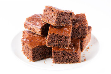A plate full of gingerbread cakes made of cocoa isolated on white background.