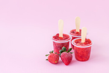 Strawberry ice cream on pink background