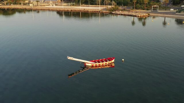 Aerial view of a red boat, for the Setoises jousting, in the Herault department in Occitanie, France