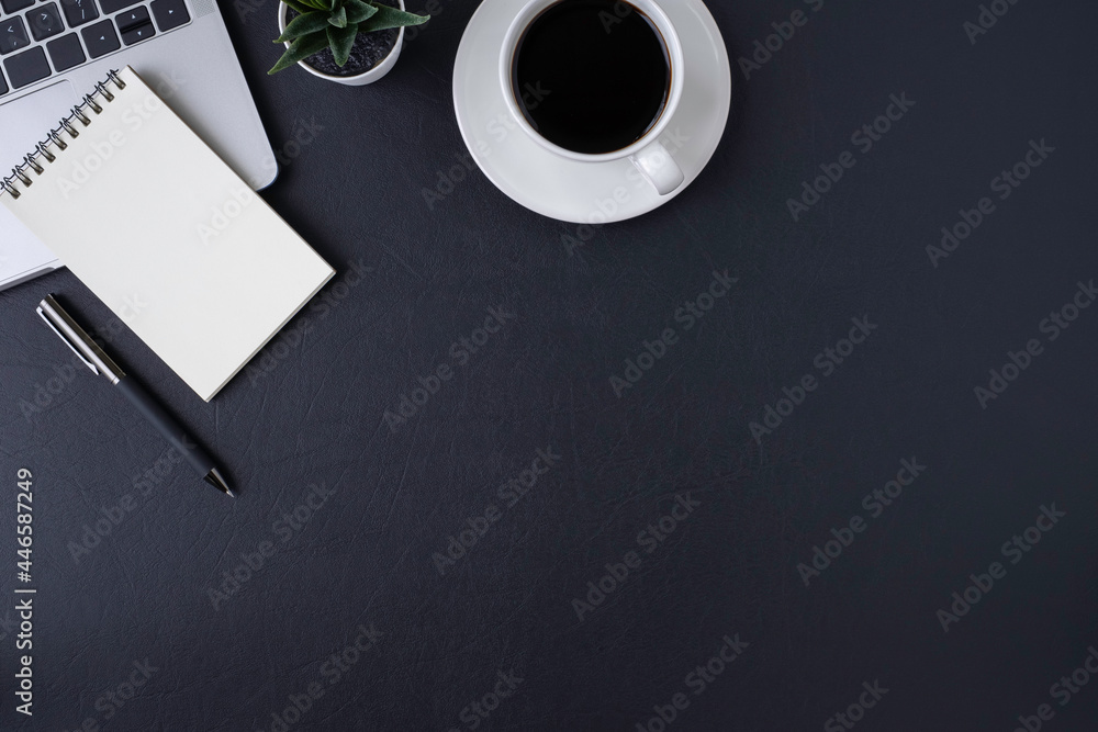 Aufkleber workplace in office with black leather office desk table. top view from above of keyboard laptop com