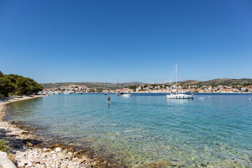 Wonderful Rogoznica bay used as natural port for sailing boats, and calm lagoon for swimming, paddle boarding and other sea activities