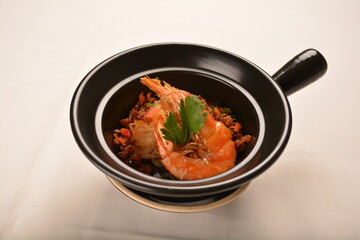 stir fried spicy chilli sauce big tiger prawn with grass vermicelli noodle mee in black clay hot pot asian halal menu