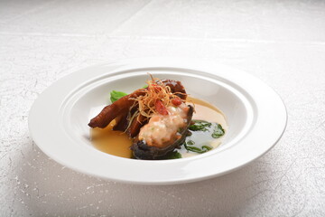 braised sea cucumber with minced meat and chicken claw feet meat in thick oyster sauce asian halal menu