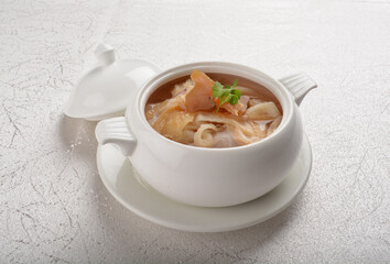 double boiled luxury seafood shark's fin crab meat and mushroom thick soup in hot clay pot asian premium halal menu