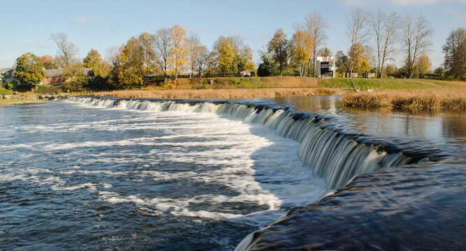 Venta waterfall in autumn day, the widest waterfall in Europe, long exposure photo, Kuldiga, Latvia
