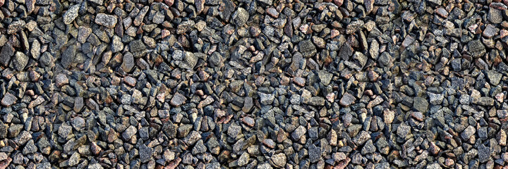 Seamless texture of gravel in HDR mode for game design. Crushed granite and pebble gravel texture.