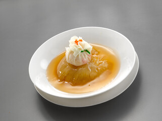 double boiled luxury seafood shark's fin crab meat and mushroom thick soup in hot clay pot asian...