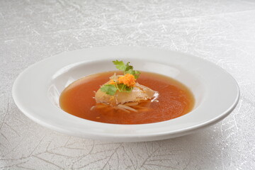 double boiled luxury seafood shark's fin crab meat and mushroom thick soup in hot clay pot asian premium halal menu