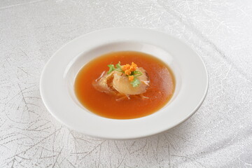 double boiled luxury seafood shark's fin crab meat and mushroom thick soup in hot clay pot asian premium halal menu
