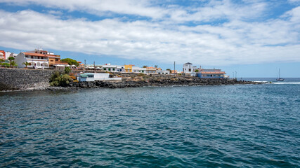 Ample panoramic views of the small resort with beautiful traditional architecture, local fish restaurants and tranquil atmosphere, La Caleta, Costa Adeje, Tenerife, Canary Islands, Spain