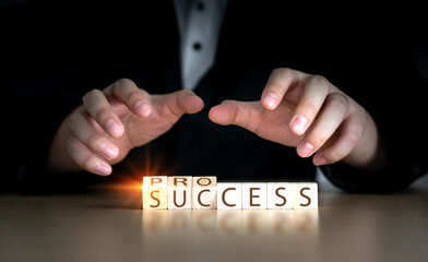 Management and Process for success concept. hand of businessman flip Wooden cube block with word process to success.