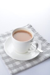 hot cocoa chocolate, milk tea, milk coffee kopi mocha latte cappuccino in white cup white background asian beverage halal menu