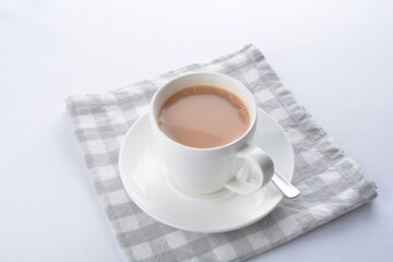 hot cocoa chocolate, milk tea, milk coffee kopi mocha latte cappuccino in white cup white background asian beverage halal menu