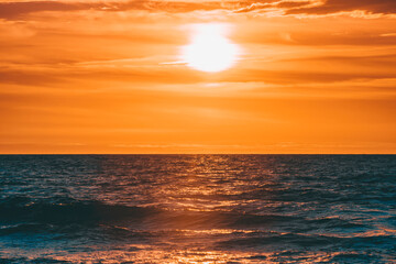 Fototapeta na wymiar orange sunset on the sea