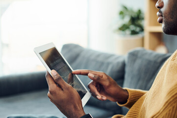 Taking it easy at home with his tech