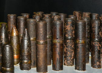 Old rusty shells from cannon cartridges of the second world war
