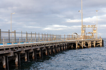 Obraz premium The kingscote jetty and crane located on Kangaroo Island South Australia on May 11th 2021