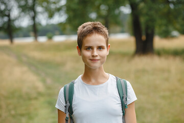 A person in nature, walking in the forest, active recreation