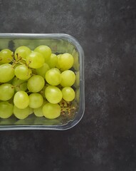 White grapes in plastic tray from above
- 446606608