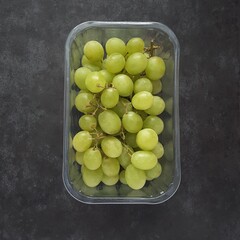 Green grapes in plastic tray from above - 446606633