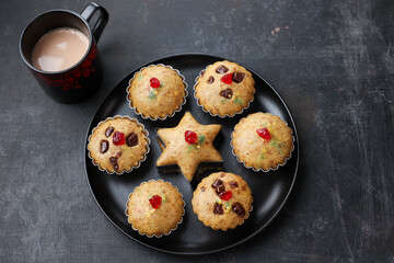 banana cup cake or muffins home made with milk tea. Indian snacks.