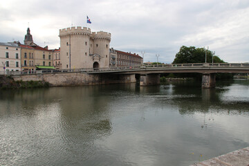 chauss&eacute;e gate, chauss&eacute;e bridge and river meuse in verdun in lorraine (france)