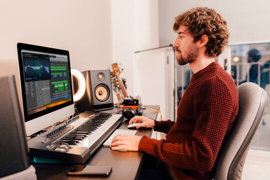 Music Producer Working At Home Music Studio