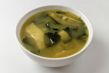 flounder seaweed soup on a white background