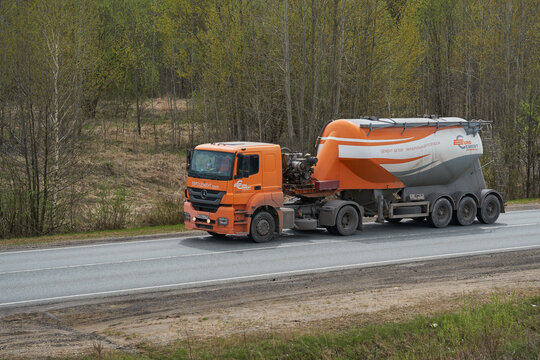 Ruzayevsky District, Mordovia, Russia - May 08, 2021: The Mercedes-Benz Axor truck with semitrailer operated by Eurocement company on the intercity road.