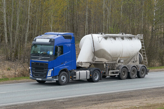 Ruzayevsky District, Mordovia, Russia - May 08, 2021: The Volvo FH truck with silo-trailer on the intercity road.