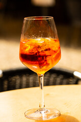 Aperol Spritz on table in restaurant, outside area