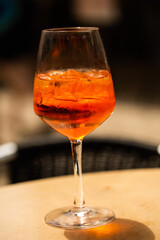 Aperol Spritz on table in restaurant, outside area