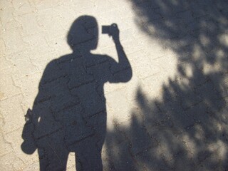 silhouette of a photographer shadow 