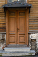 Obraz na płótnie Canvas Wooden door in the building