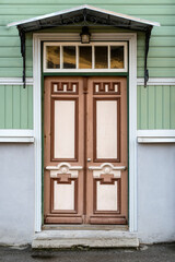 Fototapeta na wymiar Wooden door in the building