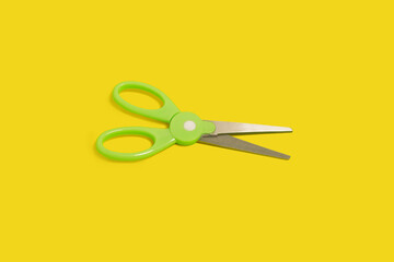 top view of scissors isolated on a yellow background - obrazy, fototapety, plakaty