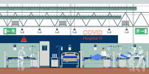 Obraz premium Covid hospital with intensive care units. Admissions to intensive care due to Covid-19. Proffessional doctors and nurses work in a hospital ward in protective suits. 