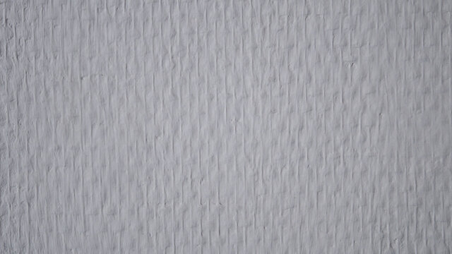 White textured painted and wallpaper on a wall
