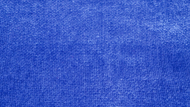 Blue fabric textured background close-up