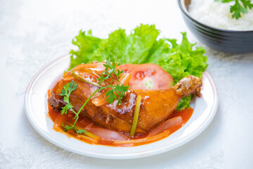 Chicken thighs with sweet and sour sauce
