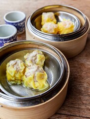 Chinese breakfast dumplings stuffed with crab in a wooden container