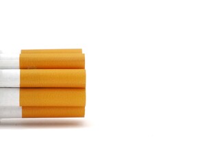 Close up of a cigarettes and the tobacco leaf that is in the cigarettes