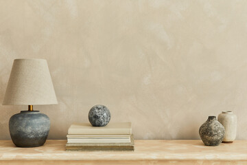 Stylish minimalistic monochromatic composition with design vases, elegant lamp and personal...